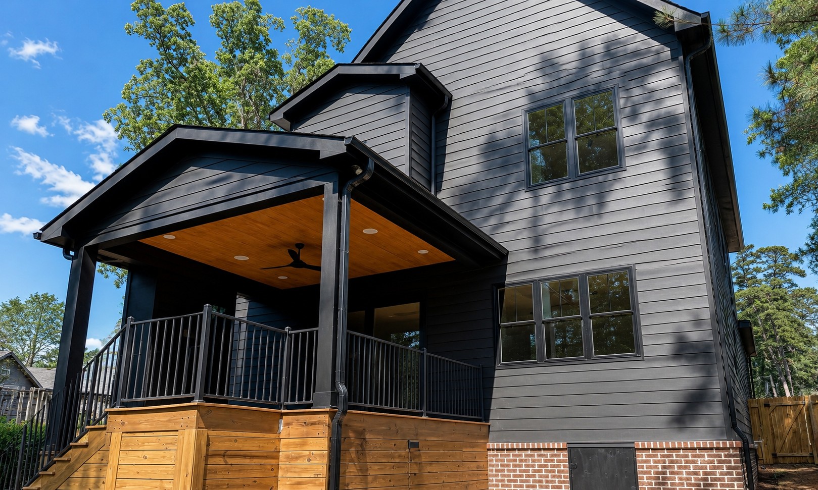 Representative home exterior with gutters and downspouts